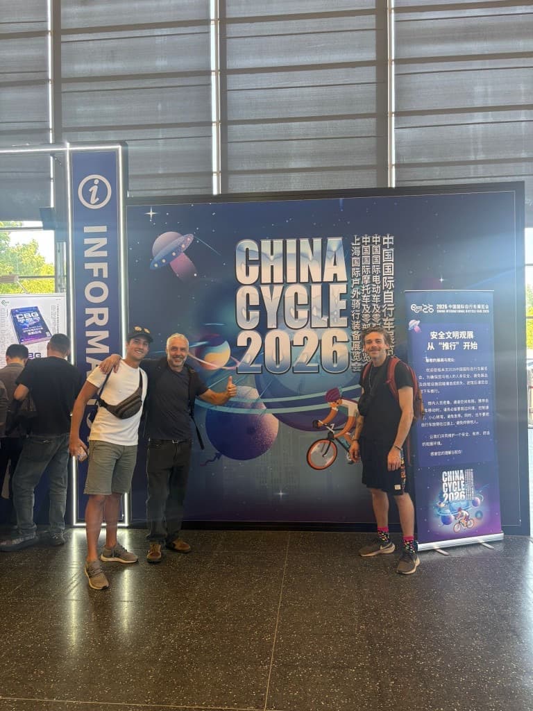 Matt inspecting a cargo e-bike on a manufacturer stand at China Cycle