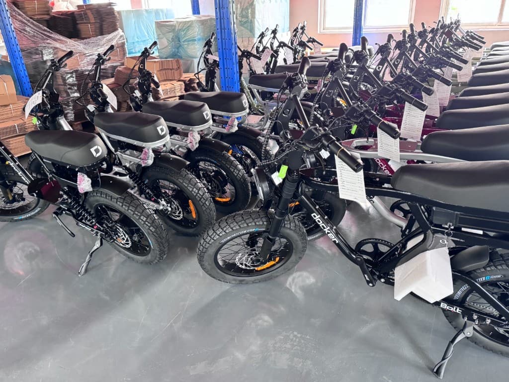 Rows of finished Docker Bolt bikes ready in the warehouse