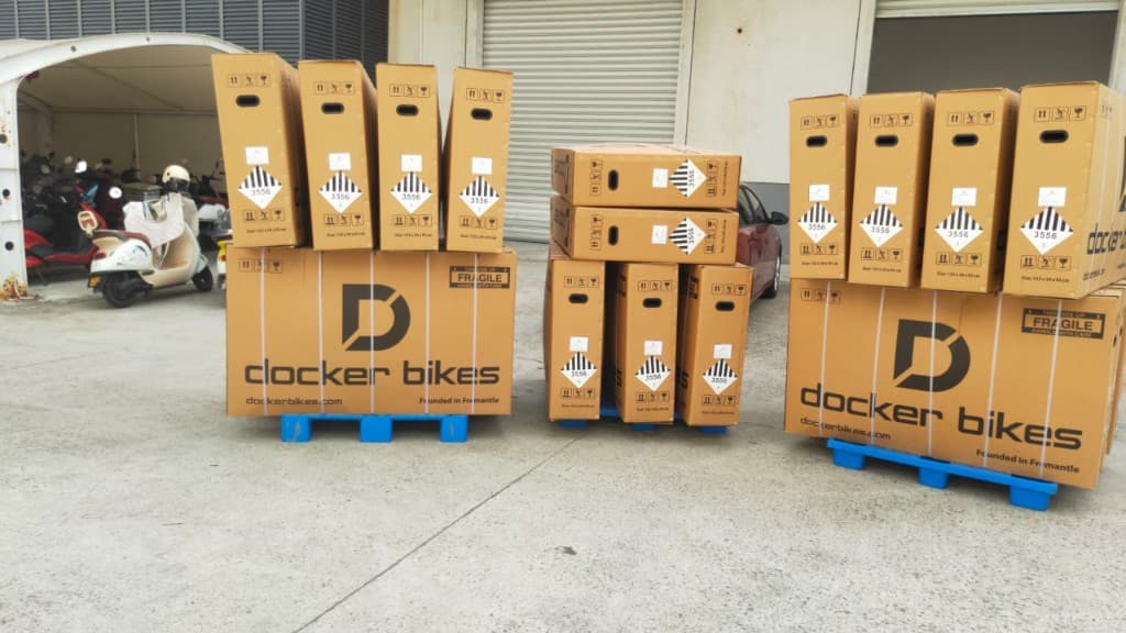 Docker bikes branded cartons ready to ship